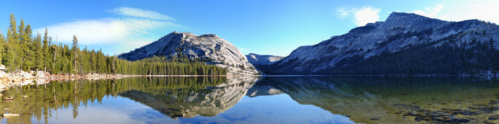 MOUNTAINS REFLECTING OFF THE LAKE