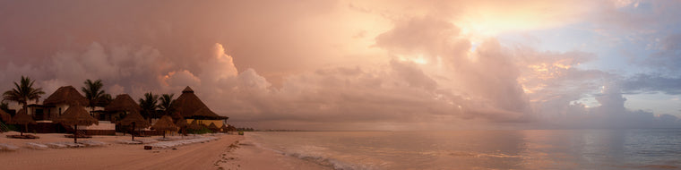 SUNRISE OVER TIKI HUTS