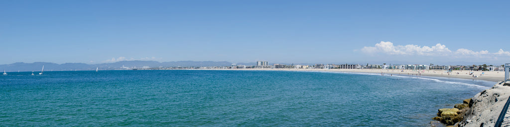 DISTANT SHORELINE OVER THE OCEAN