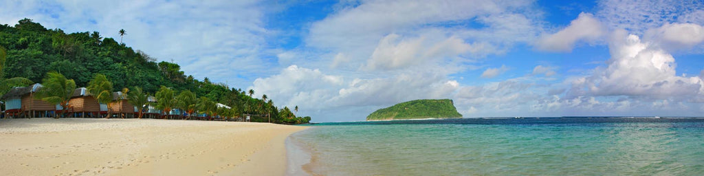 CLOUDS DRIFTING OVER THE BEACH