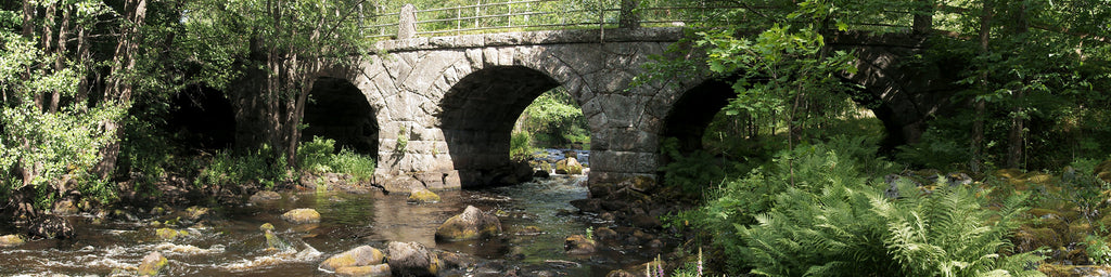 ARCH BRIDGE OVER A CREEK